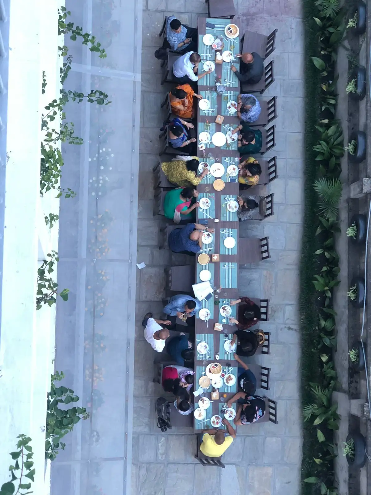 Communal dining table at The Oven, viewed from above